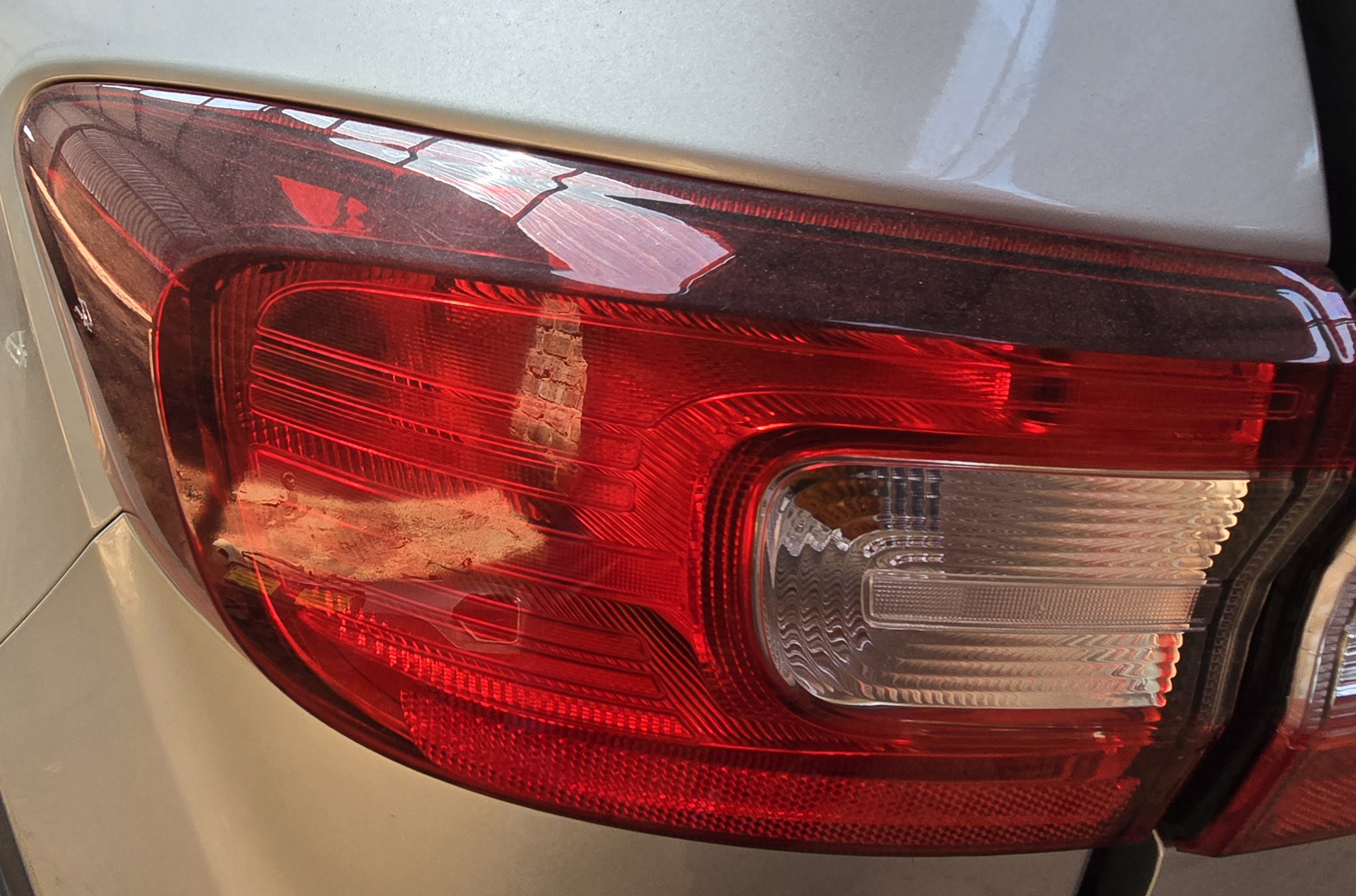 TRIBER LEFT REAR OUTER LAMP