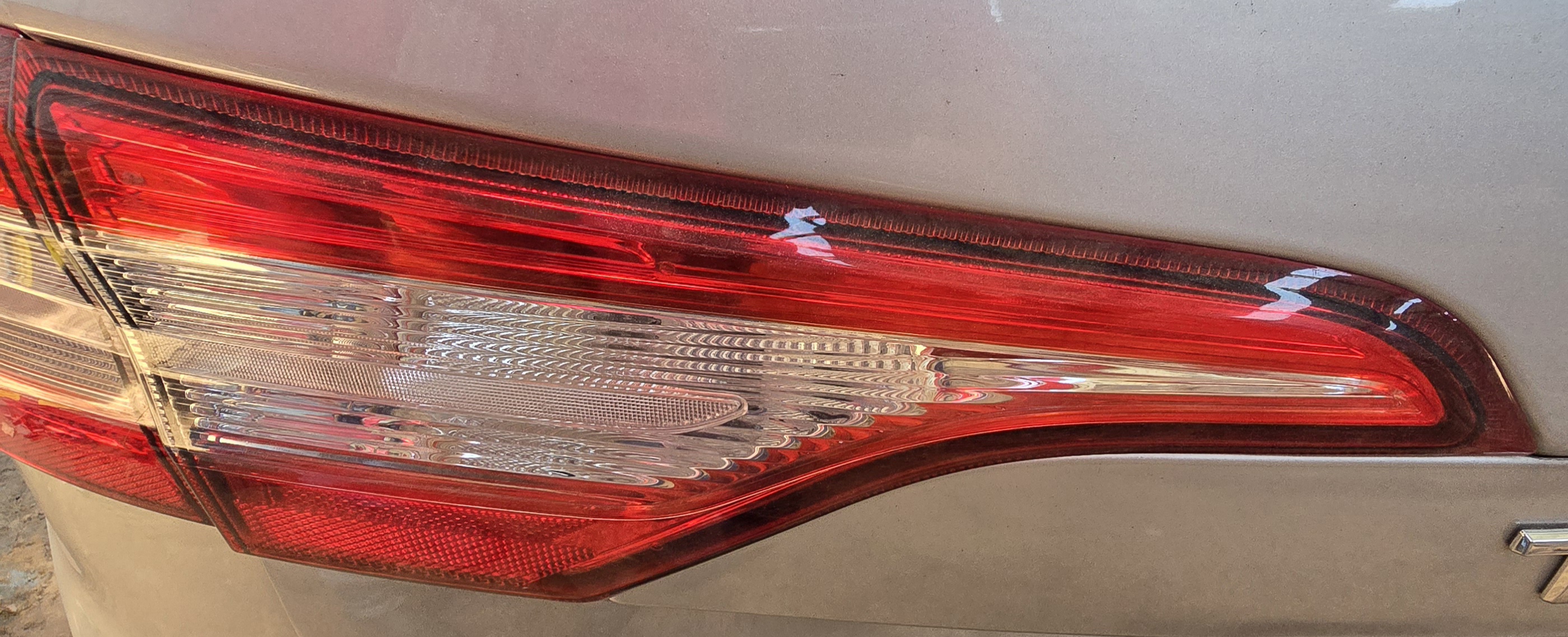 TRIBER LEFT REAR INNER TAIL LAMP