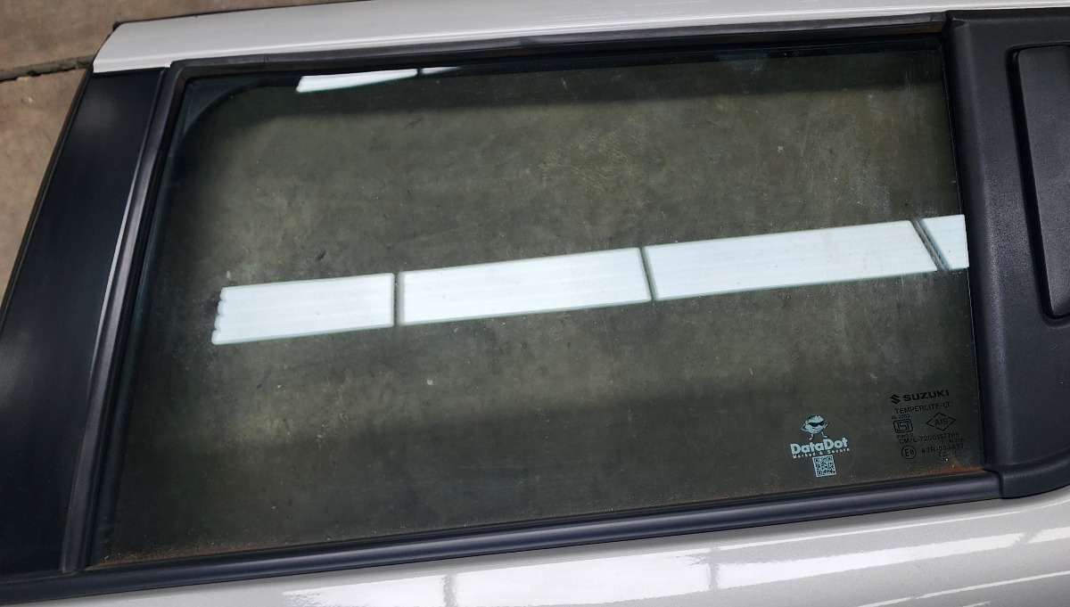 SWIFT LEFT REAR DOOR GLASS