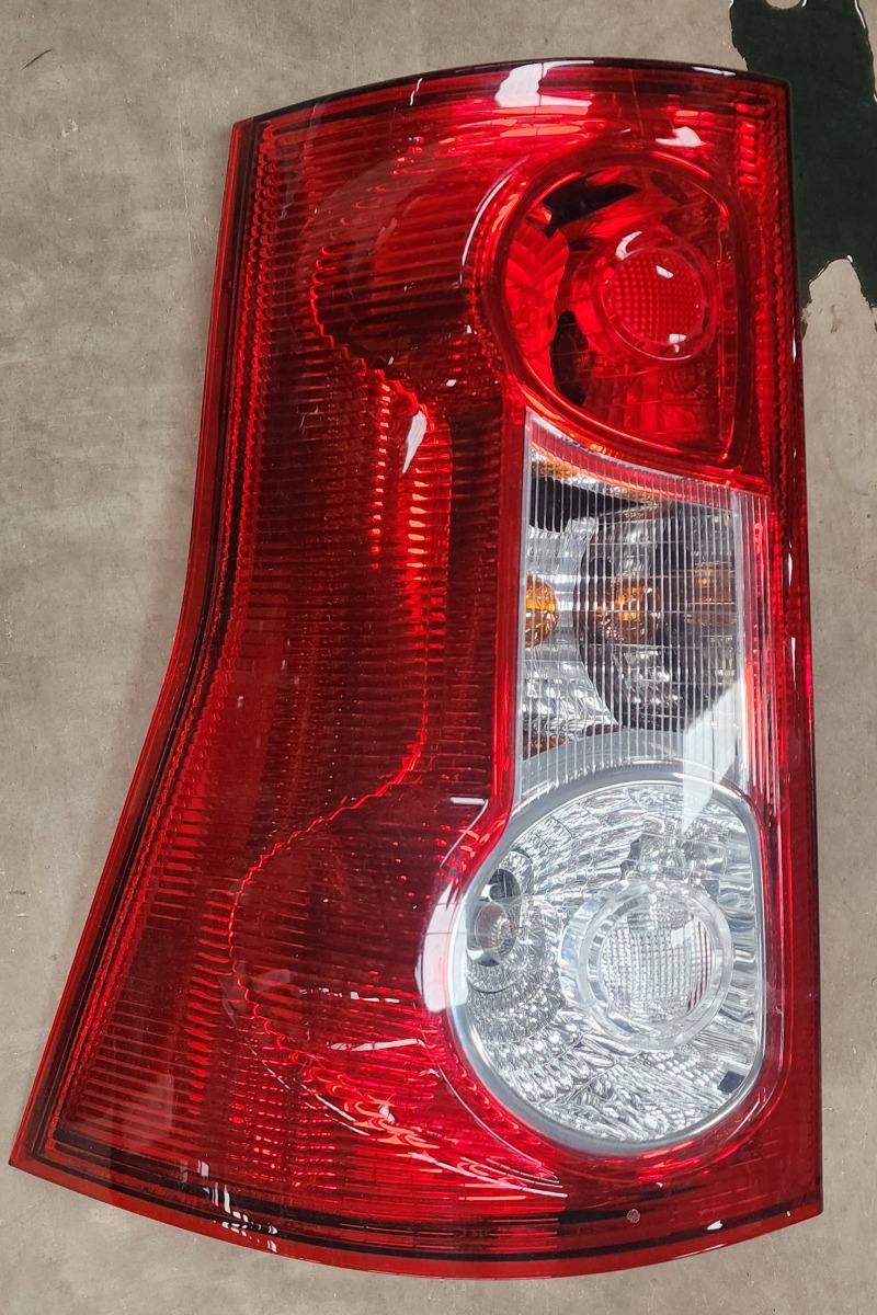 NP200 LEFT TAIL LIGHT