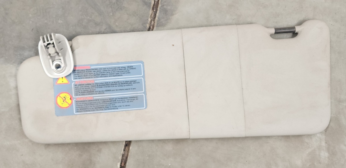 NP200 LEFT SUNVISOR