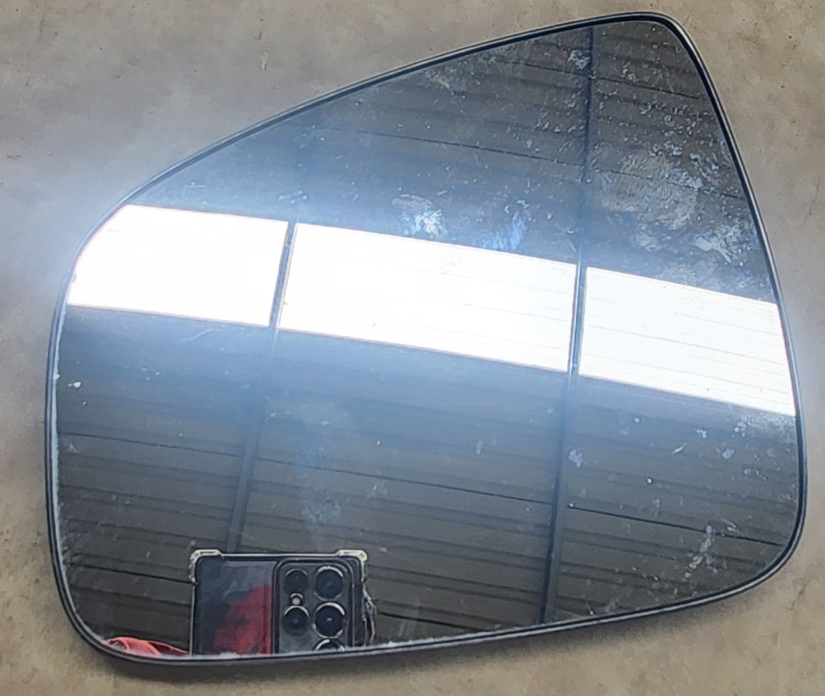 NP200 LEFT MIRROR GLASS