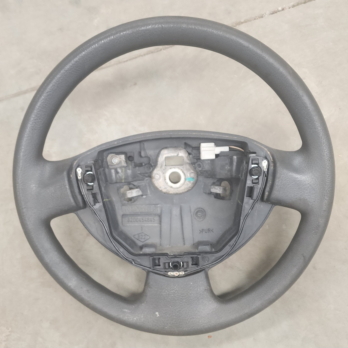 NP200 STEERING WHEEL