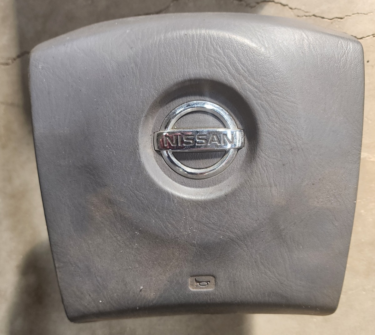 NP300 STEERING HOOTER PAD