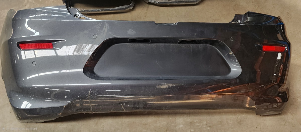 STARLET REAR BUMPER (SKIN) W/O REFLECTORS