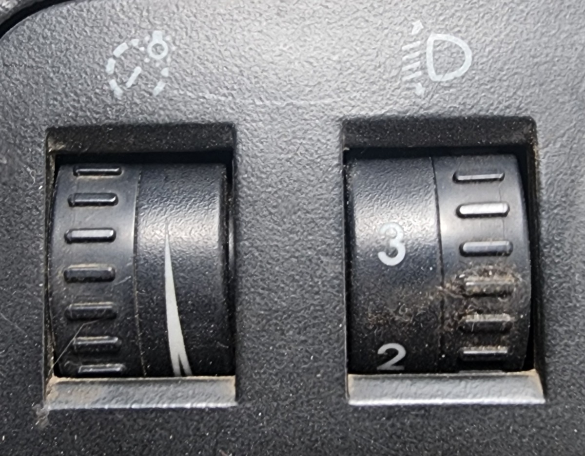 CADDY HEADLIGHT LEVEL SWITCH