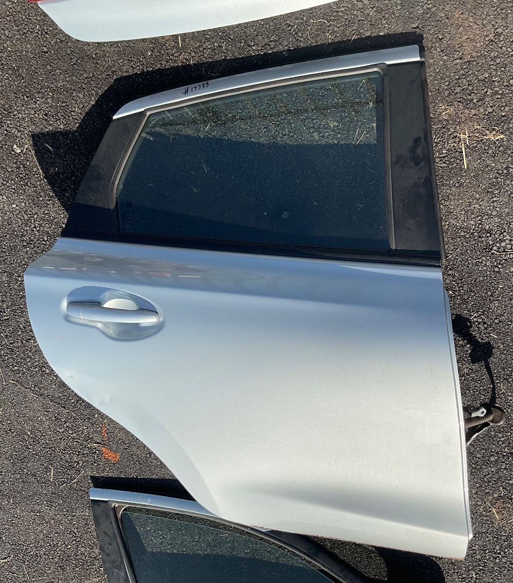 STARLET RIGHT REAR DOOR (DENTED)