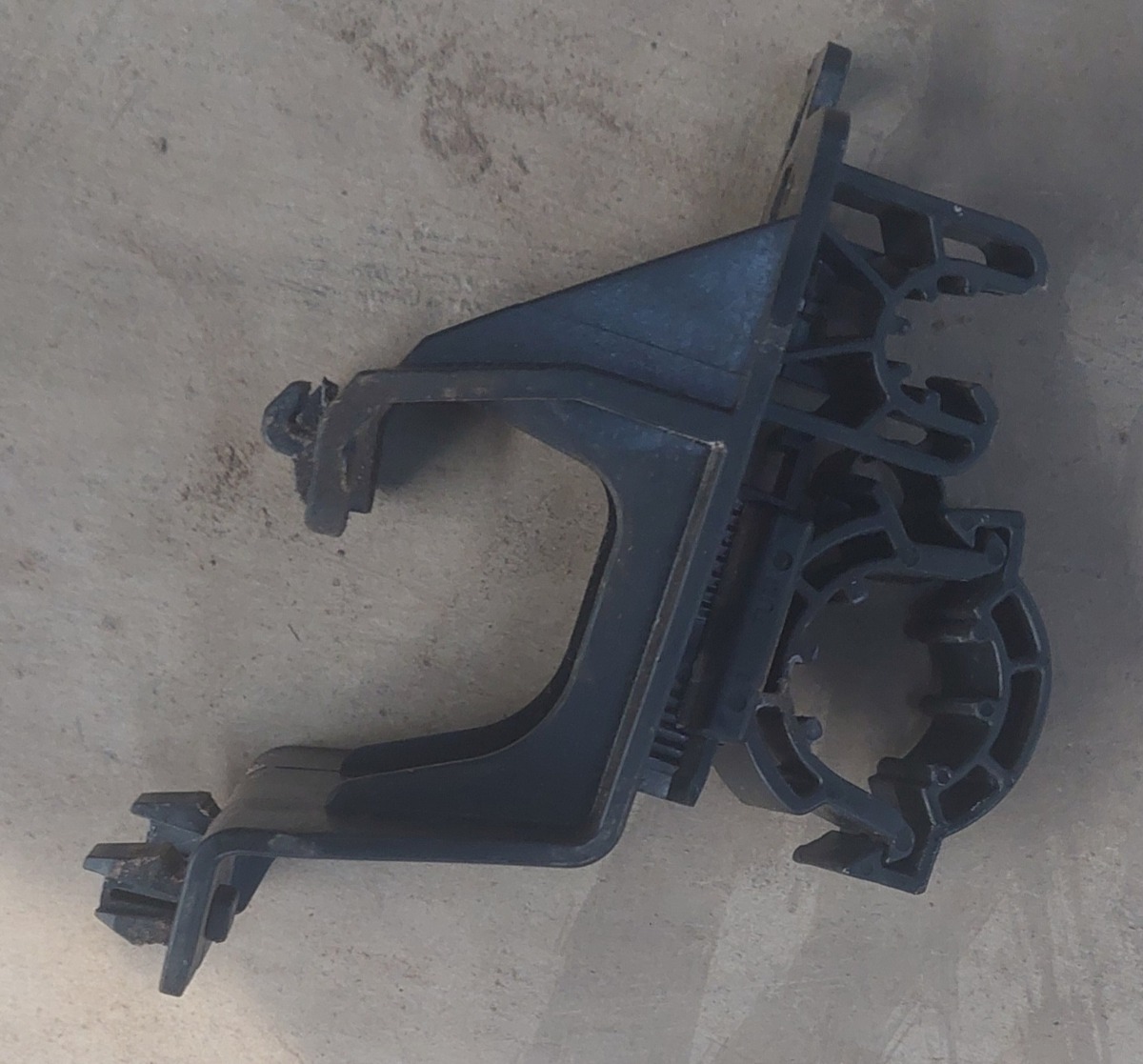 T-CROSS COOLANT LINE BRACKET