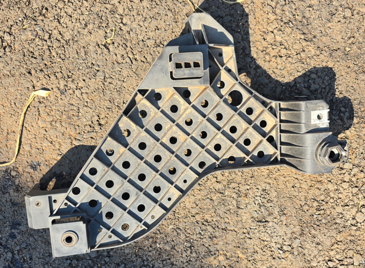 Q3 Headlamp Bracket Left Front