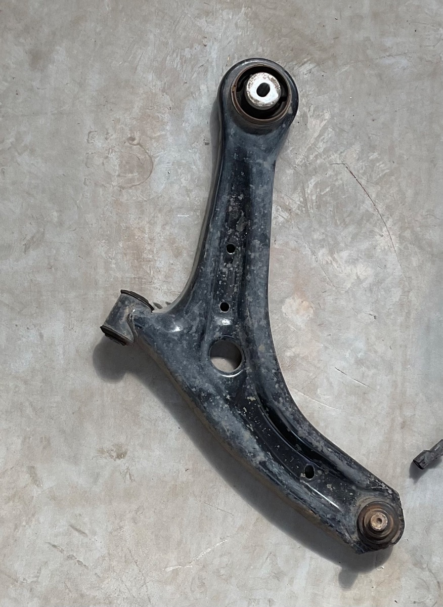 FIGO LEFT FRONT LOWER CONTROL ARM
