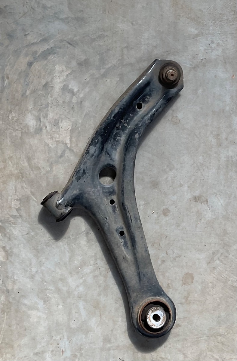 FIGO RIGHT FRONT LOWER CONTROL ARM