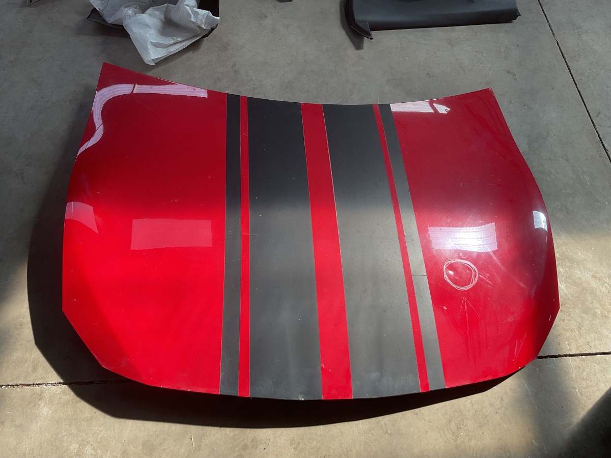 86 BONNET DENTED