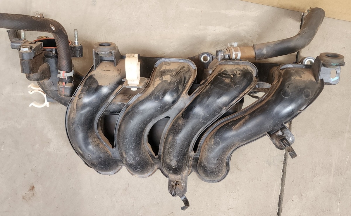 SWIFT K12MP INTAKE MANIFOLD