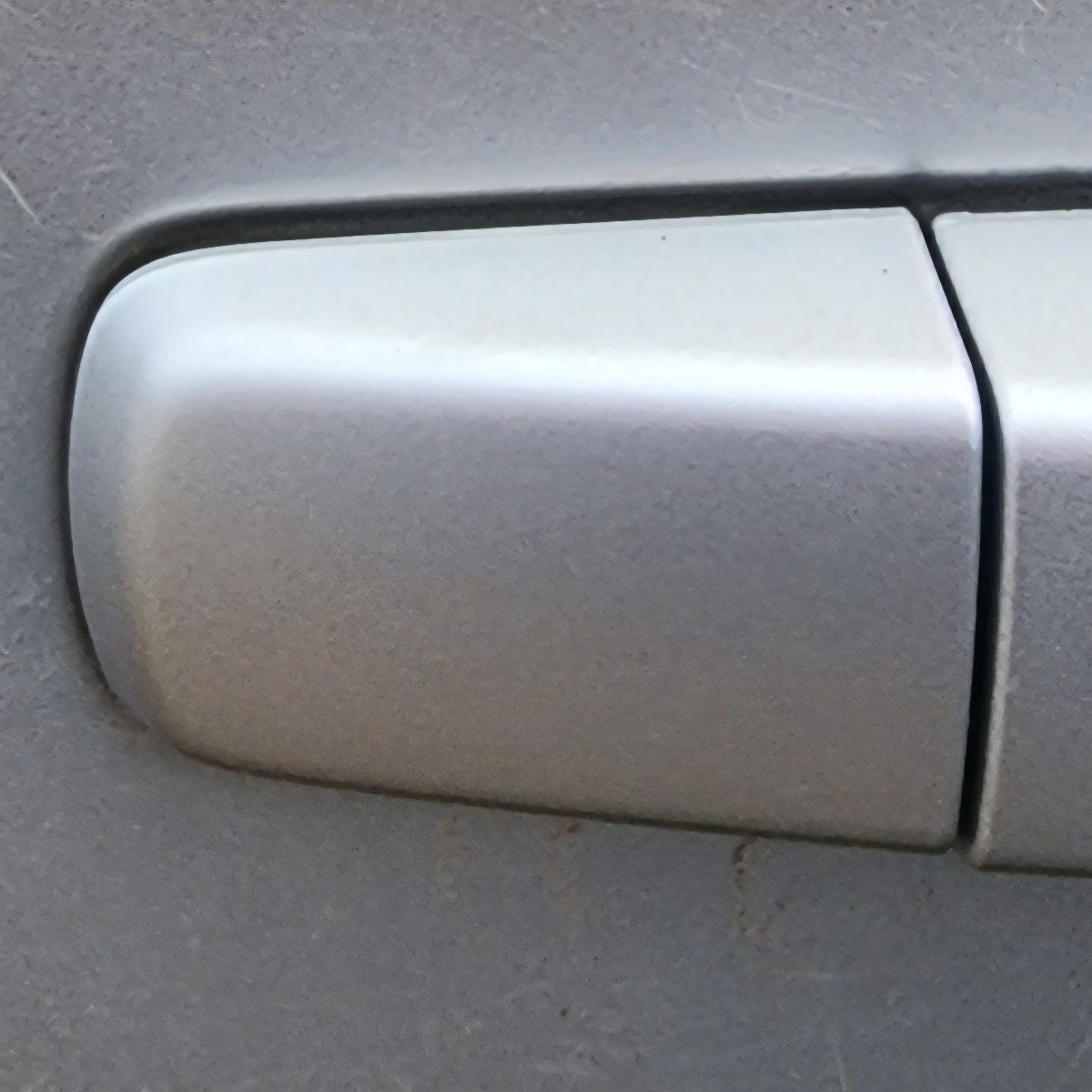 NAVARA REAR RIGHT HANDLE END PIECE