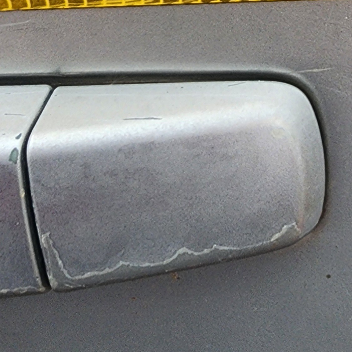 NAVARA LEFT REAR HANDLE END PIECE