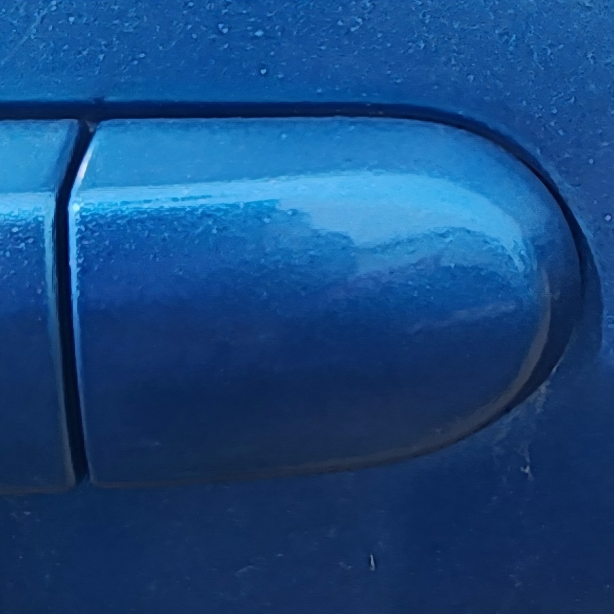 TIIDA LEFT REAR HANDLE END PIECE