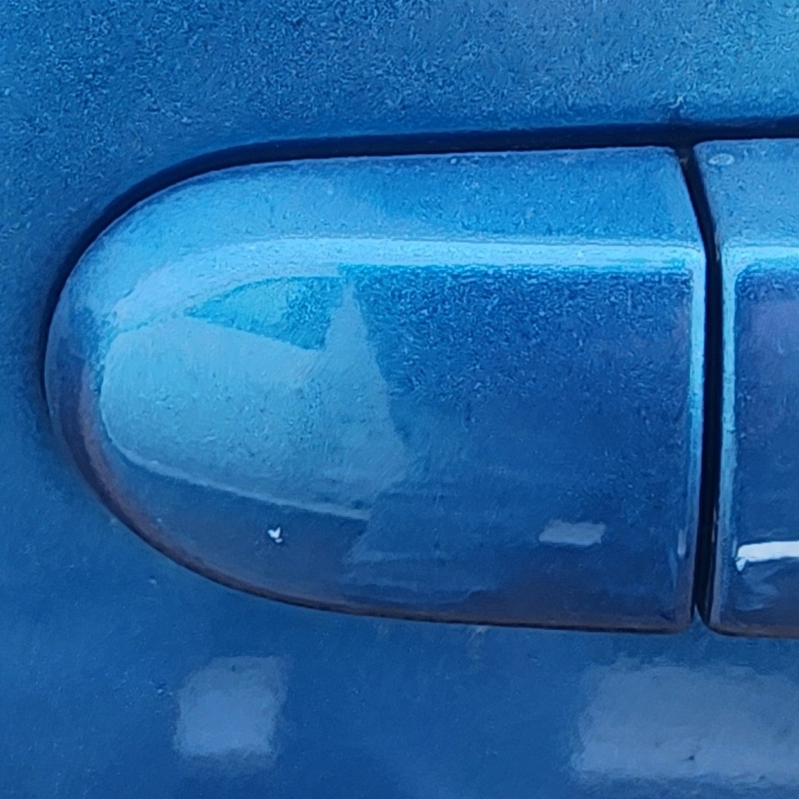 TIIDA RIGHT REAR HANDLE END PIECE