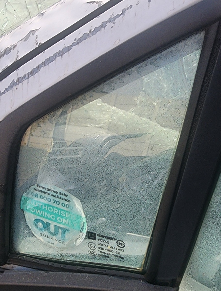 SPARK LEFT FRONT QUARTER GLASS