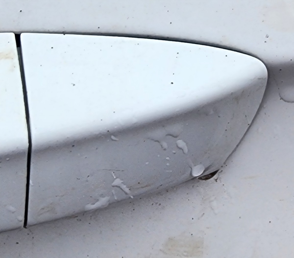 T-CROSS LEFT FRONT HANDLE END PIECE