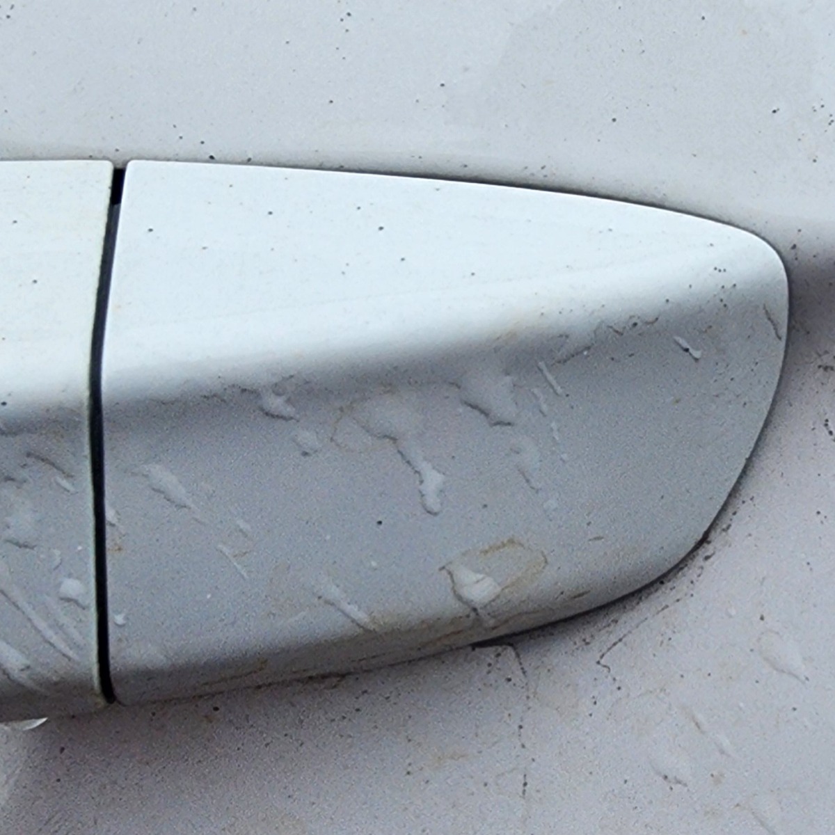 T-CROSS LEFT REAR HANDLE END PIECE