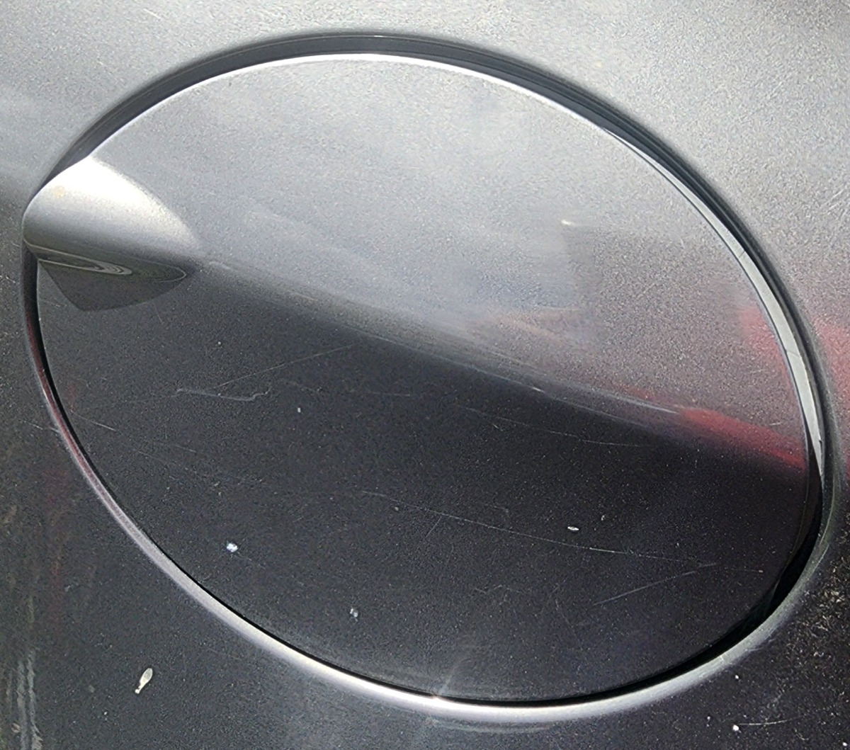 E87 FUEL FLAP