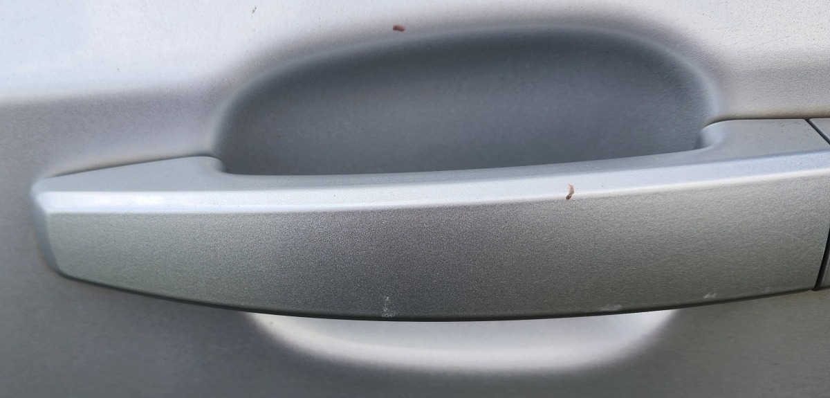 SONIC SEDAN LEFT FRONT HANDLE