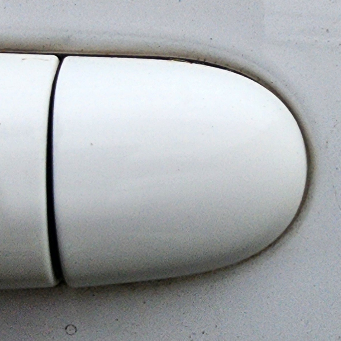 4FOUR LEFT REAR HANDLE END PIECE
