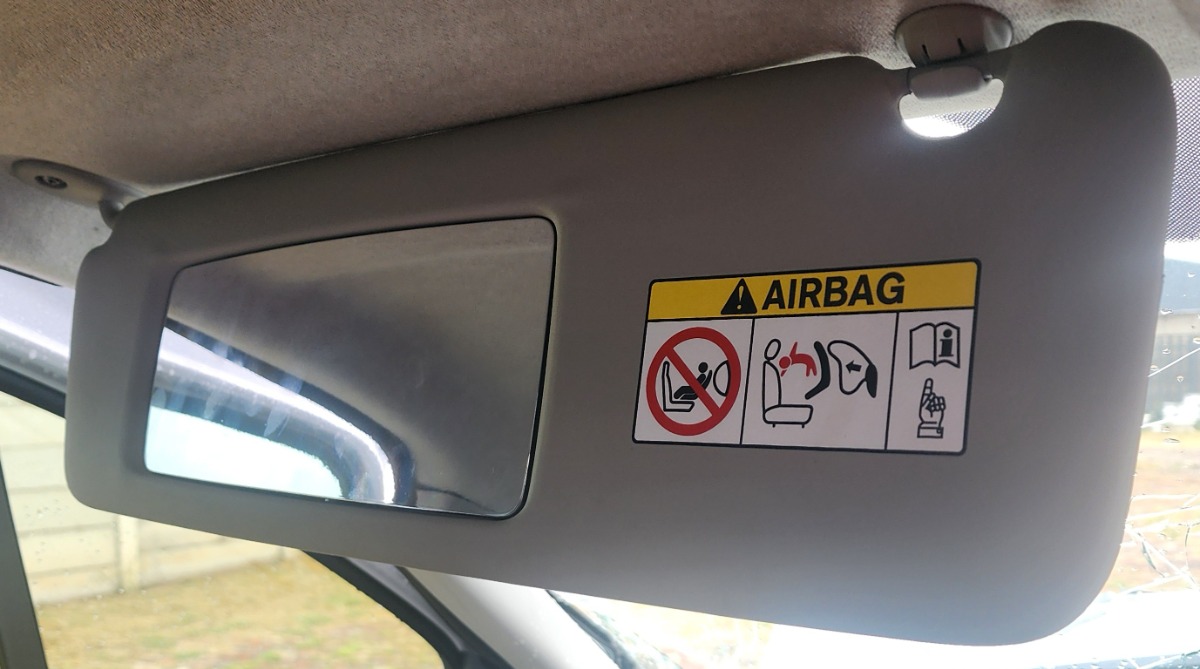 TRAFFIC LEFT SUNVISOR
