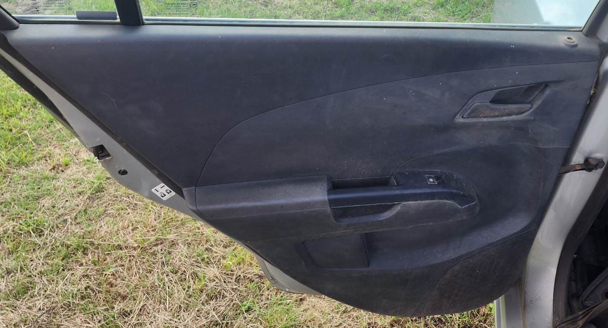 SONIC SEDAN LEFT REAR DOOR PANEL