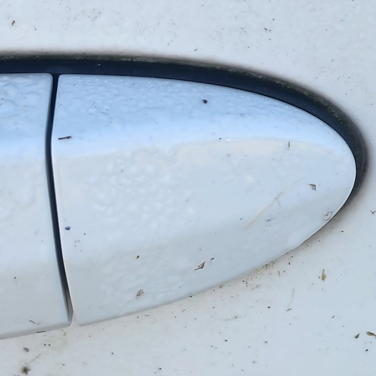E83 LEFT FRONT HANDLE END PIECE