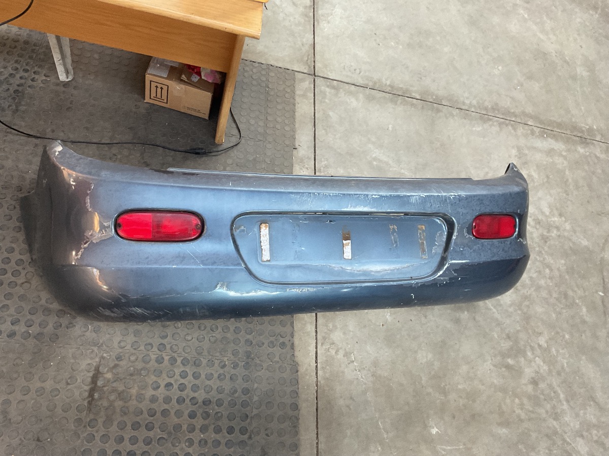 NEON 1,6 REAR BUMPER (WITH REFLECTORS)