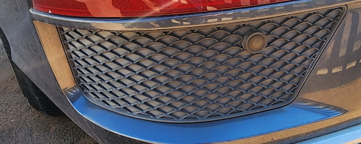 W166 GL63 LEFT REAR BUMPER GRILL (WITH PDC HOLE)