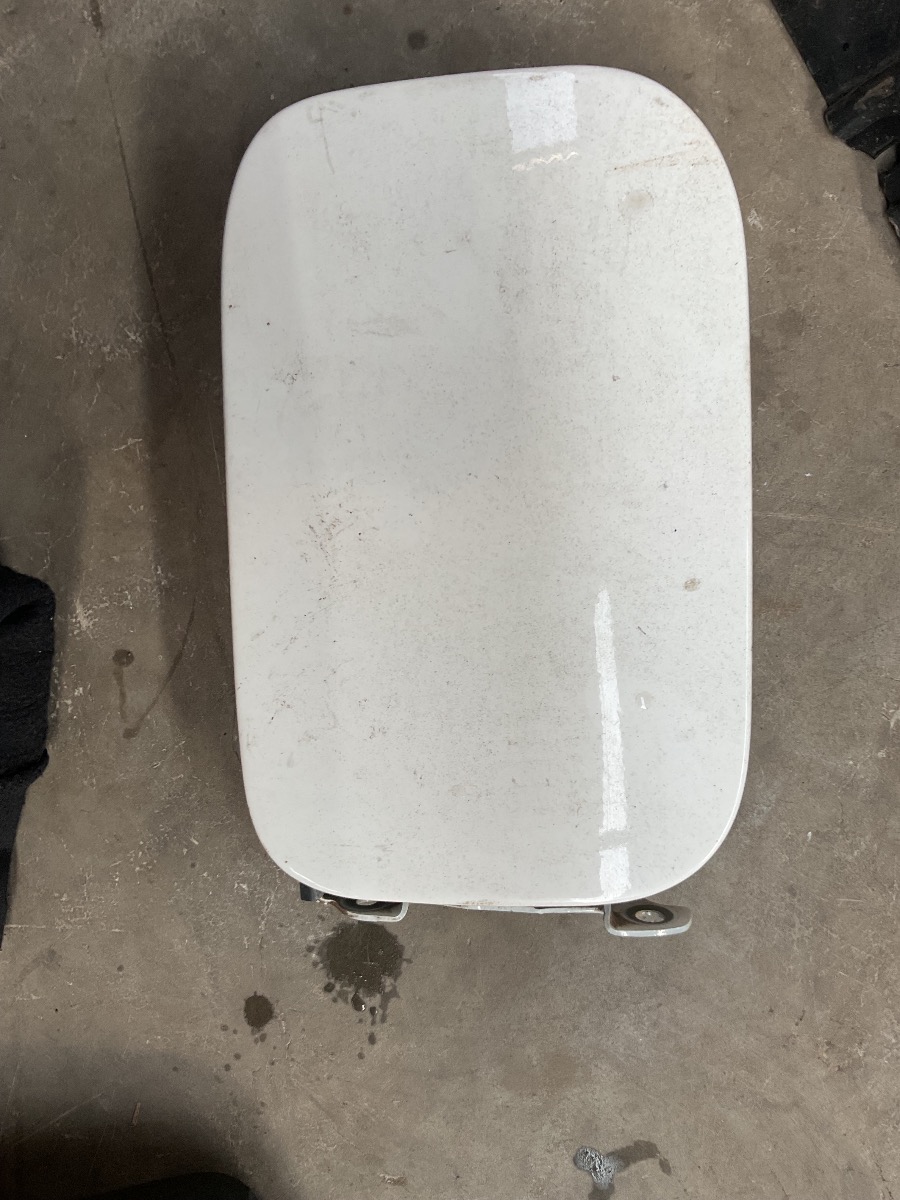 NP200 PETROL FLAP