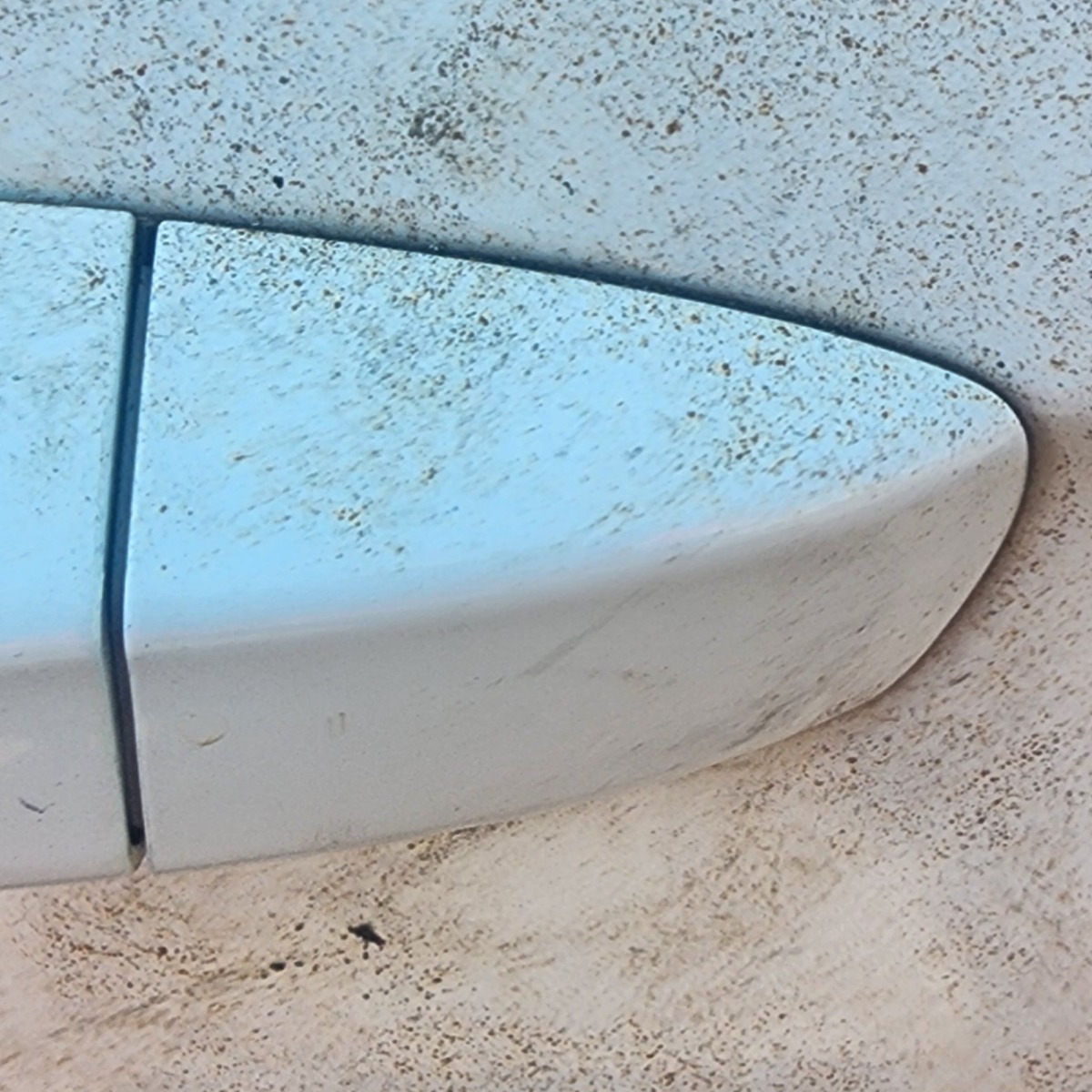 POLO MK8/9 LEFT FRONT HANDLE END PIECE