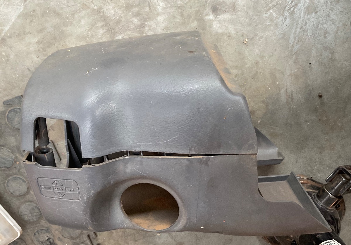 NP300 STEERING COLUMN COVER
