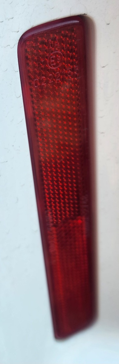 STARLET CROSS LEFT REAR REFLECTOR