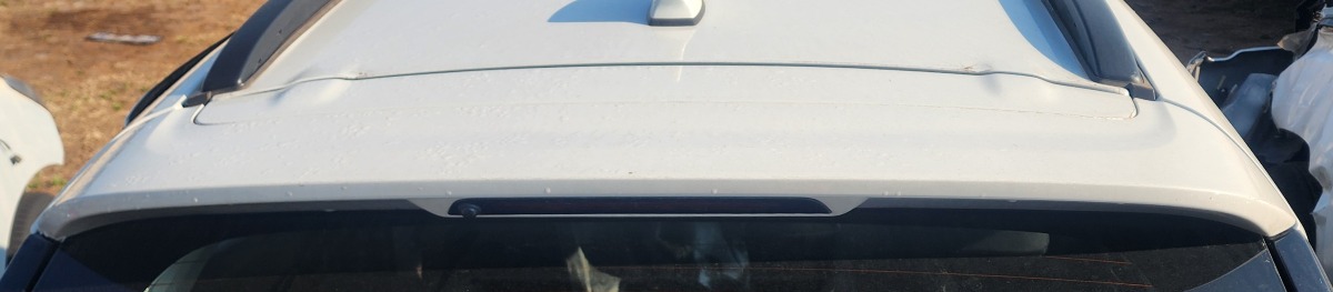 STARLET CROSS TAILGATE SPOILER
